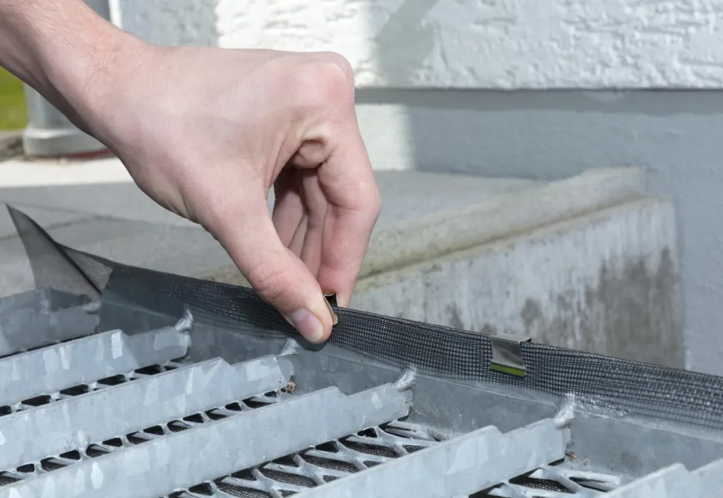 Dirt and small animal deflectors for light shafts, fiberglass fabric
