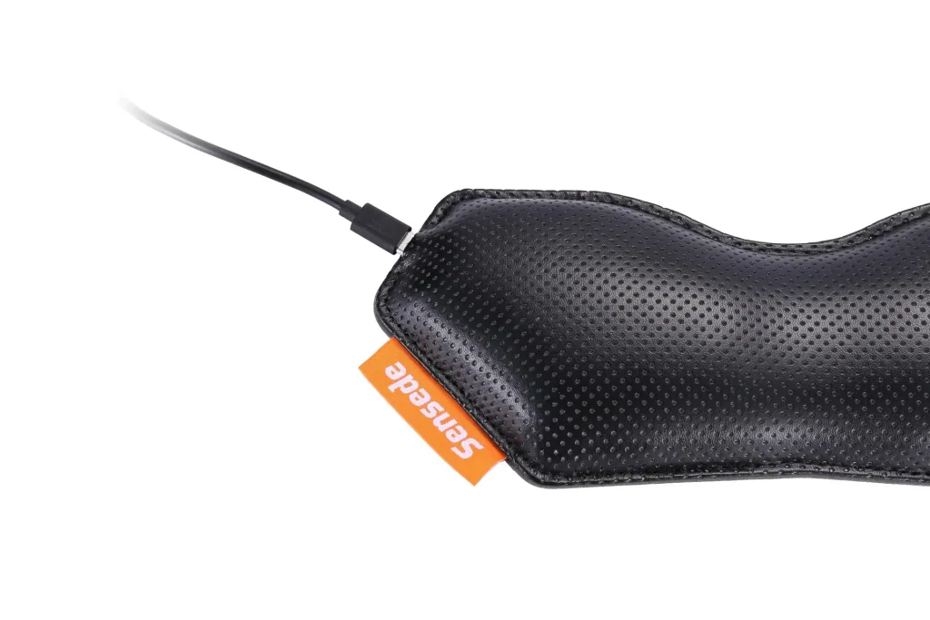 Heated ergonomic mouse wrist rest