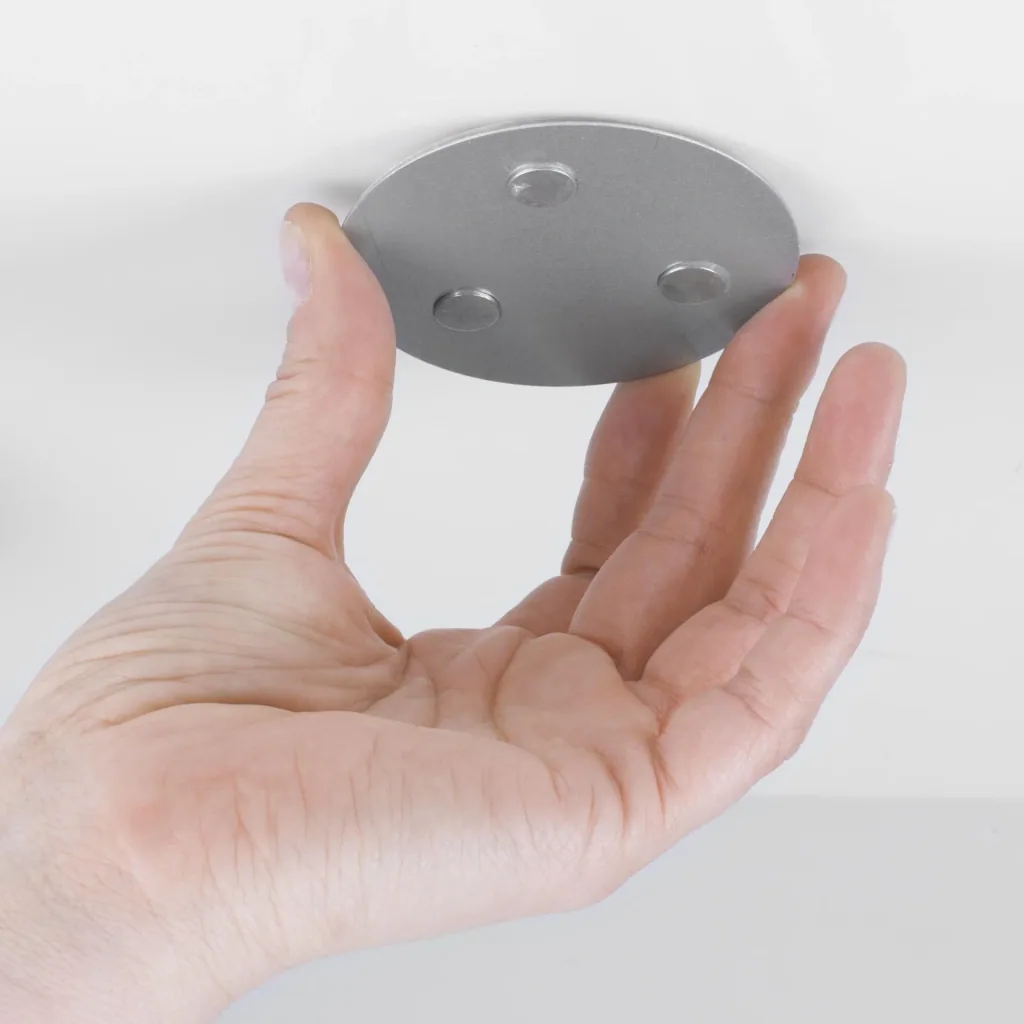 Magnetic attachment for smoke detectors